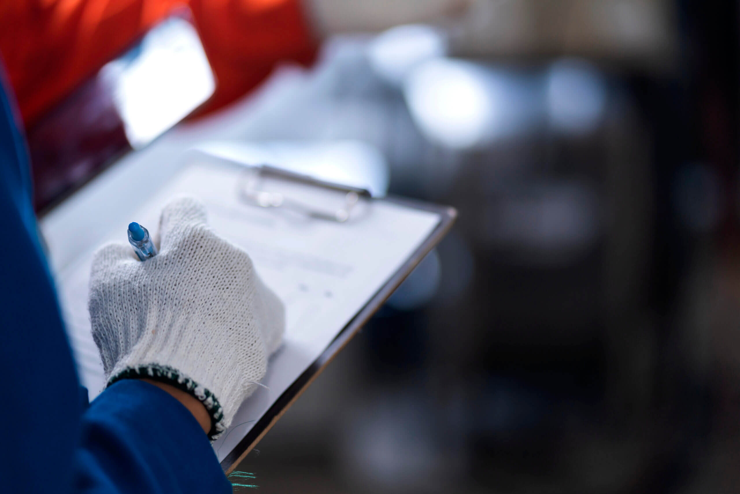 close-up-female-engineer-hand-controling-robot-arm-welding-machine-industrial-40-modern-factory-backgroundsmart-female-engineer-inspect-quality-control-factory